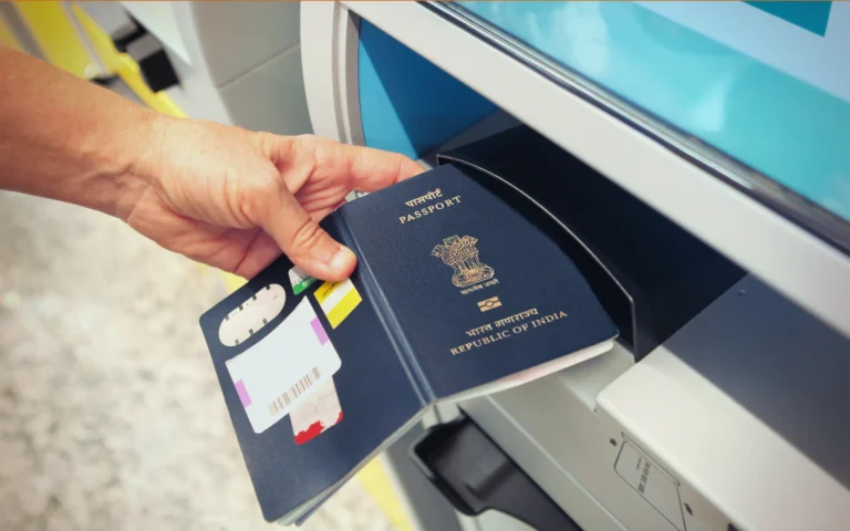 A new Indian e-passport held in hand in the UAE, showing the gold chip symbol on the cover