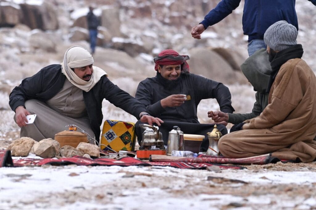 Locals enjoying Snow in saudi arabia