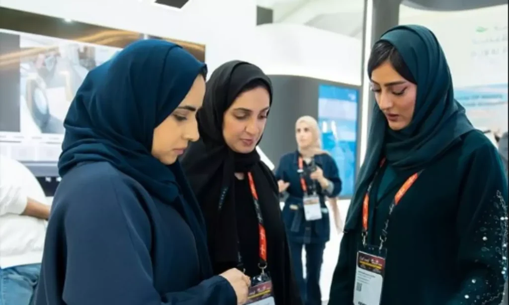 Lab technicians explaining the new insect residue unit at Dubai Municipality Gulfood 2026.