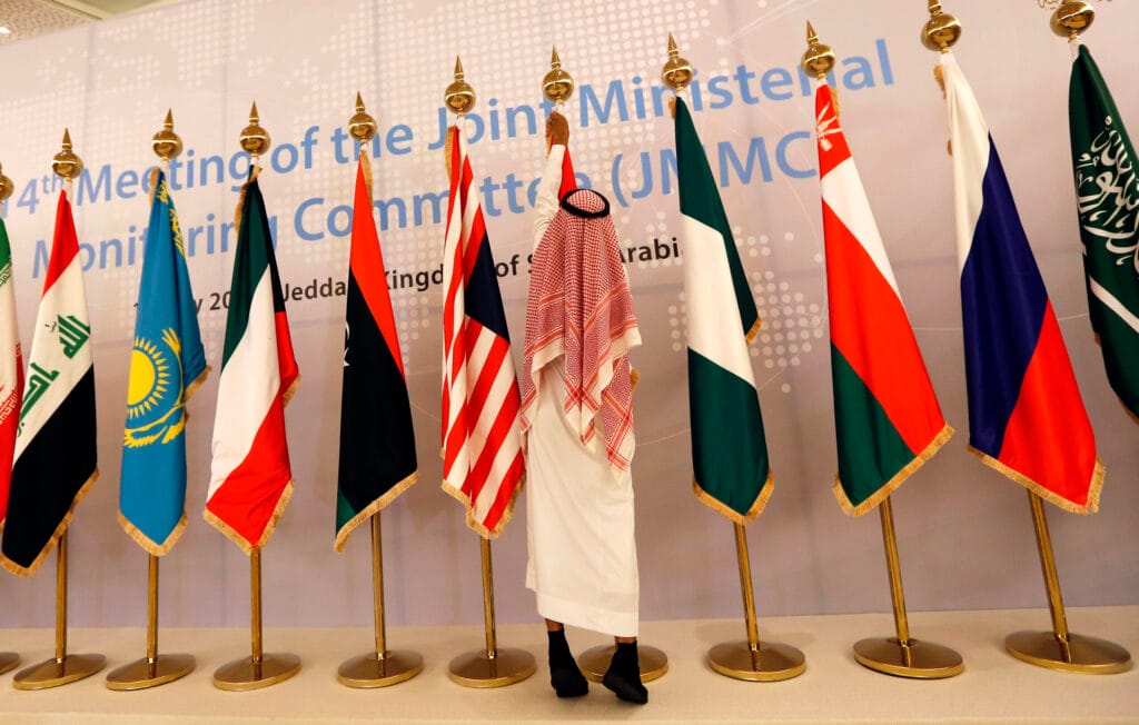 UAE and Saudi energy delegates negotiating OPEC+ production cuts 2026.