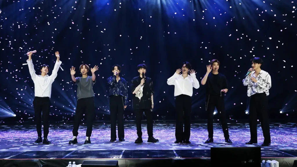 BTS World Tour 2026 promotional image featuring RM and Jungkook.