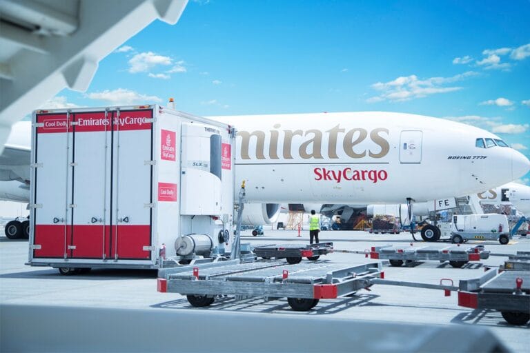 Cargo crew loading temperature-controlled shipments aligning with the Emirates SkyCargo 2026 strategy.