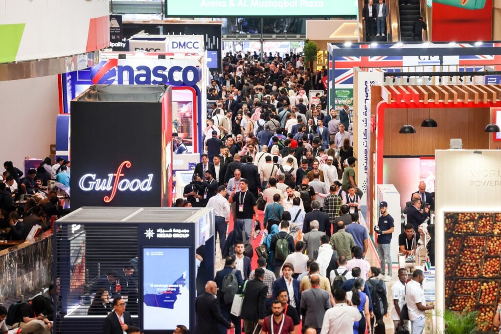 Crowd shot of the busy exhibition halls at Gulfood 2026 in Dubai.