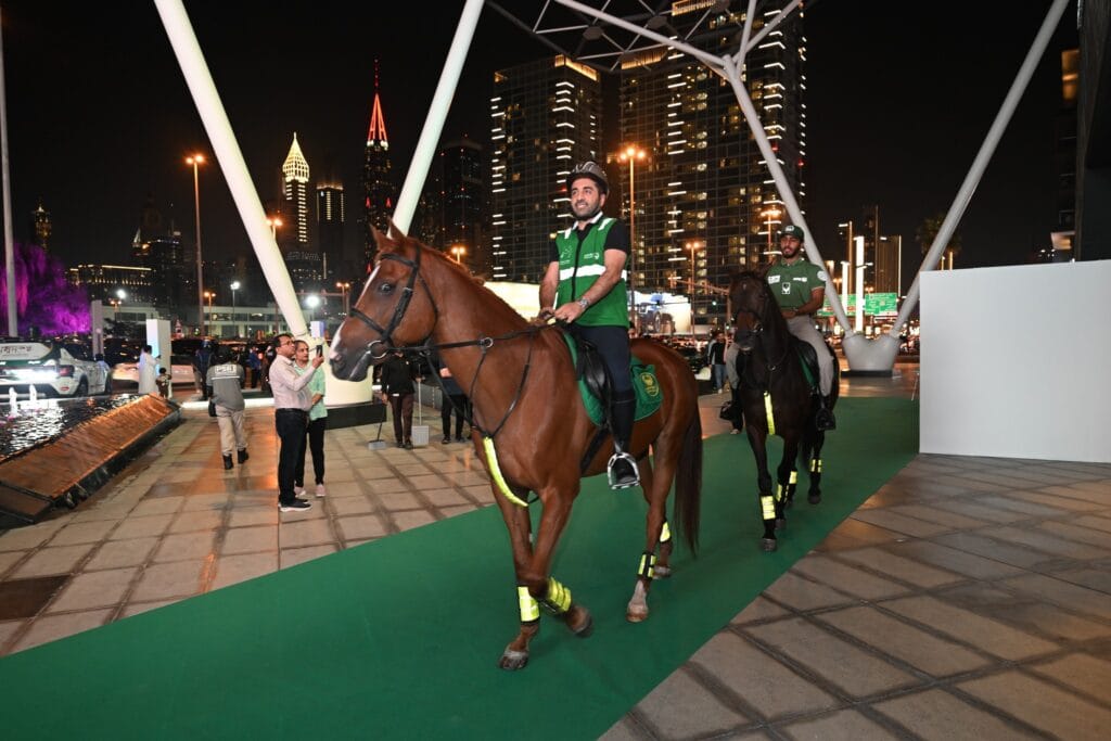 Dubai police with Trained horses performing during the live show at the Dubai Police Carnival