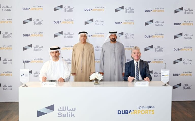 Official signing ceremony for Dubai Airports & Salik e-wallet parking payments agreement.