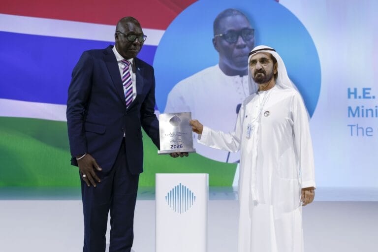 Sheikh Mohammed bin Rashid presenting the Best Minister Award to Abdoulie Jobe at WGS 2026.