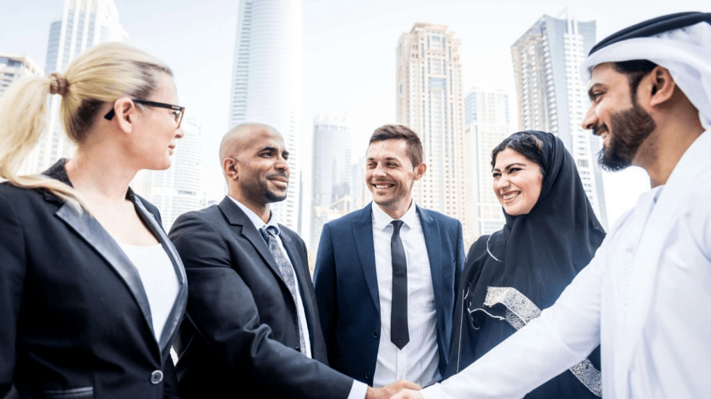Business meeting reviewing Basic Salary UAE structure and benefits