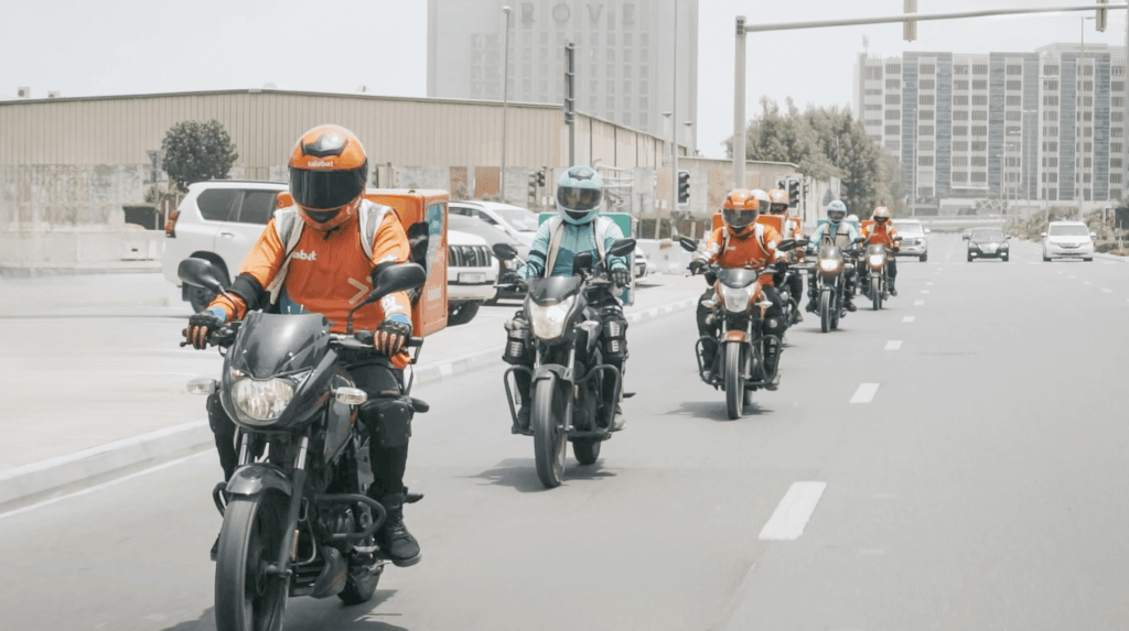 Delivery motorcycles queued for Dubai delivery bike registration test