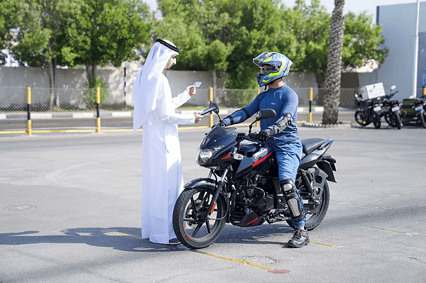 RTA official checking motorcycle for Dubai delivery bike registration